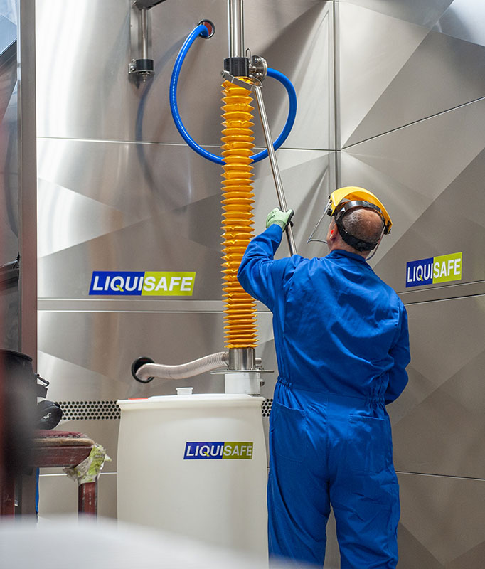 man transferring hazardous liquids with liquisafe