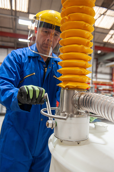 man handling hazardous liquids with liquisafe