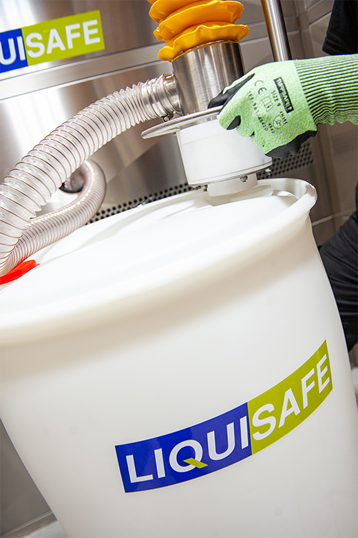 man handling hazardous liquids with liquisafe